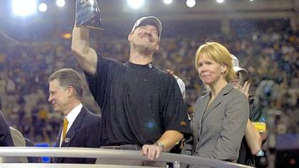 Steelers coach Bill Cowher celebrates beside his wife Kaye after beating Seattle for the Super Bowl title.