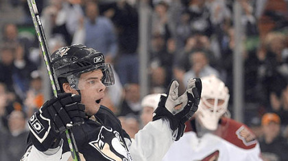 The Penguins' Tyler Kennedy celebrates his goal in the third period against the Coyotes at Mellon Arena. (vs. Coyotes 12/2/2007)