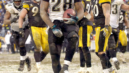 The Jaguars' Fred Taylor walks into the end zone for the winning touchdown late in the fourth quarter against the Steelers yesterday at Heinz Field. (vs. Jaguars 12/16/2007)
