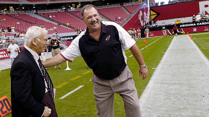 Cardinals assistant head coach Russ Grimm greets his former boss, Steelers owner Dan Rooney.