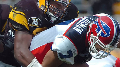 Steelers linebacker James Harrison sacks Buffalo quarterback J.P. Losman.