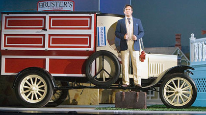 Tenor John Nuzzo stands on a truck with a Bruster's Ice Cream logo during a performance of the Pittsburgh Opera's production of "The Elixir of Love" at the Benedum Center.