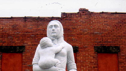 This granite statue of a mother and two children was installed last December in the town square of Monongah, W.Va. The statue honors the widows of the men who died in the coal mining industry's worst explosion on Dec. 6, 1907. The late Rev. Everett Briggs, a Catholic priest who died two weeks after it was installed, played a key role in erecting the monument.