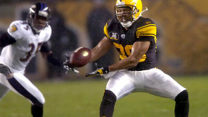 Wide receiver Hines Ward is able to pull in a pass in the driving rain against the Ravens in the first quarter.(vs. Ravens 11/05/07)