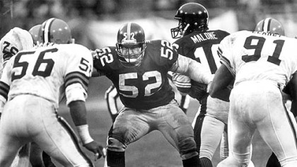 How Mike Webster is best remembered: In the middle of the line, taking on all comers, protecting his quarterback. The Iron Man played 15 seasons with the Steelers but ended his career with the Kansas City Chiefs.