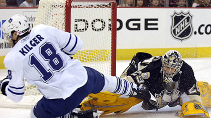 Marc-Andre Fleury makes save against the Leafs Chad Kilger.