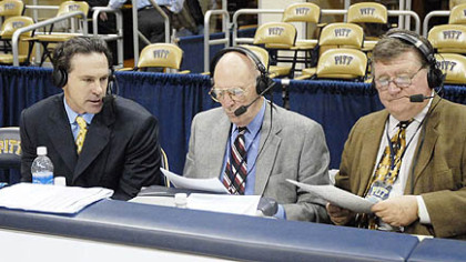 Dick Groat, center, and Bill Hillgrove do a post-game interview with Pitt coach Jamie Dixon, left.