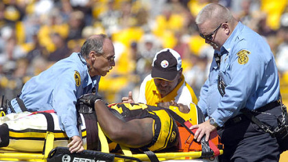 Linebacker James Harrison is taken off the field after an injury at the end of the second quarter.