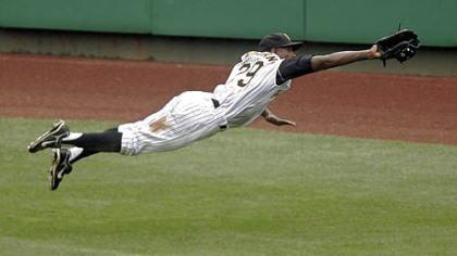 
Center fielder Nyjer Morgan makes a diving catch of a fly ball hit by the Cubs' Aramis Ramirez in the third inning yesterday at PNC Park.