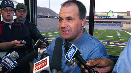 West Virginia football coach Rich Rodriguez speaks to the media at a morning news conference Saturday at Milan Puskar Stadium in Morgantown, W.Va., but refused to address reports that he was a candidate for the University of Michigan job.