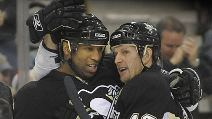 Gary Roberts and Georges Laraque celebrate their collaboration on a goal in the second period of the Penguins' 4-2 win yesterday against the Boston Bruins at Mellon Arena. (12/23/2007)