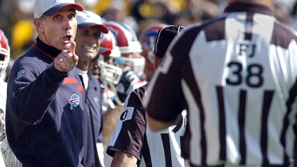 Bills head coach Dick Jauron gives field judge Eddy Powers a piece of his mind.