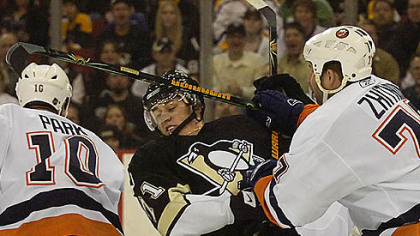 Evgeni Malkin doesn't have to worry about how he is getting to America anymore, but hard checks from the likes of the Islanders' Alexei Zhitnik still will be a concern.