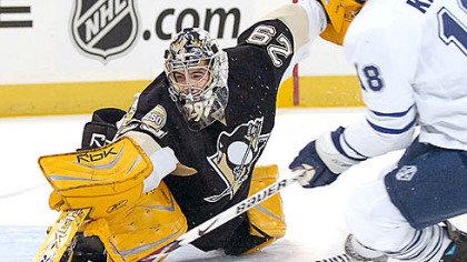 Marc-Andre Fleury makes a save on the Maple Leafs' Chad Kilger in the first period.