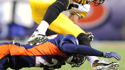 Hines Ward makes a catch.