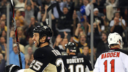 
The Penguins' Max Talbot celebrates his goal in the first period against the Devils.