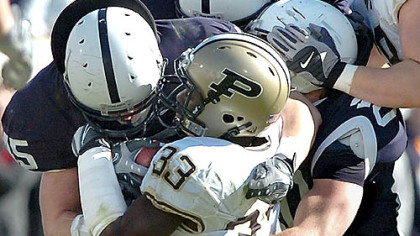 Dan Connor & company gang up on Purdue's Jaycen Taylor on Saturday.