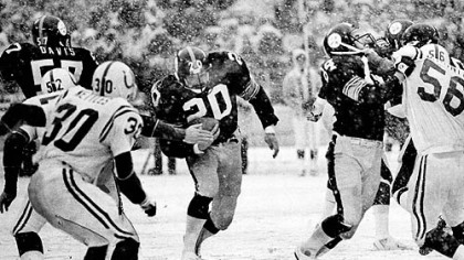 Getting a block from Randy Grossman, 84, Steelers Rocky Bleier charges through a hole for a good gain against Baltimore Colts, 1978.