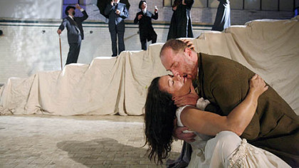 In Quantum Theatre's "Therese Raquin," Robin Walsh and Hugo Armstrong (foreground), are the illicit lovers while their family and friends remain oblivious.