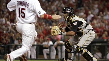Ronny Paulino waits for the throw as the Cardinals' Jim Edmonds scores on a three-run double by Chris Duncan in the third inning last night in St. Louis.