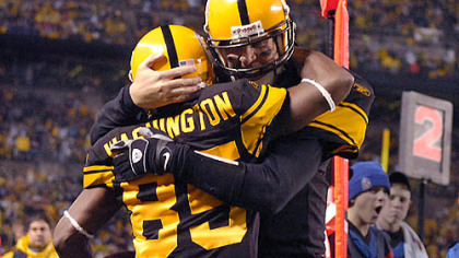 Steelers quarterback Ben Roethlisberger celebrates with linebacker Nate Washington after throwing his fourth touchdown of the first half against the Ravens.(vs. Ravens 11/05/07)