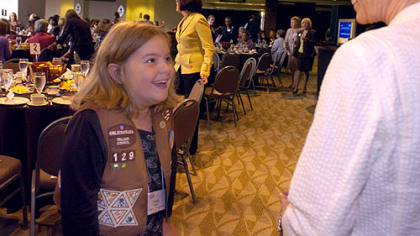 Gracie Eddie, 9, of Peebles Elementary School in McCandless, is all smiles as she talks to former astronaut Dr. Sally Ride yesterday at the Heinz Field East Club Lounge.