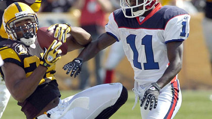 Steelers free safety Ryan Clark appears to have an interception against Bills Roscoe Parrish but is ruled an incomplete pass.