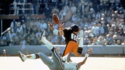 Pittsburgh Steelers Lynn Swann dives as he catches a pass from quarterback Terry Bradshaw during Super Bowl X at the Orange Bowl in Miami, Florida Jan. 18, 1976 against the Dallas Cowboys.