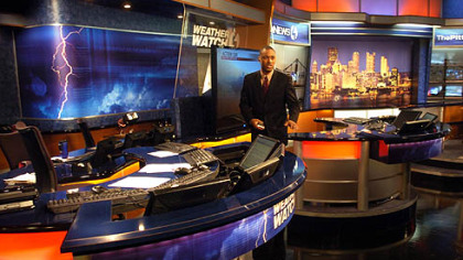 Meteorologist Demetrius Ivory familiarizes himself with WTAE's new studio set, including the two-desk set-up now available for weather reporting.