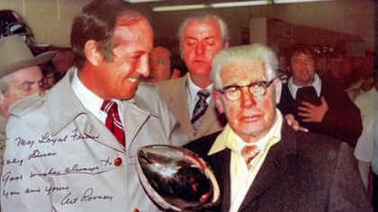 NFL commissioner Pete Rozelle (left), Joey Diven (center) and Steelers owner Art Rooney in the team's locker room with the Lombardi trophy won by the Steelers in Super Bowl IX. The autograph on the photo reads: "To my loyal friend Joey Diven. Best wishes always to you and yours. Art Rooney."