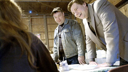 U.S. Rep. Jason Altmire, right, chats with constituents at the Beaver County Maple Syrup Festival at Brady's Run Park in March. In center is Steven Roberts of Aliquippa.