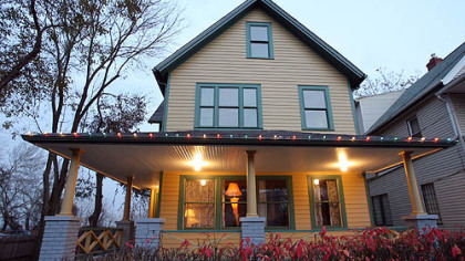 A leg lamp glows in the window of "A Christmas Story" House and Museum in Cleveland's Tremont neighborhood. Brian Jones has restored the three-story, wood-frame house to its appearance in the movie and it's open for tours.