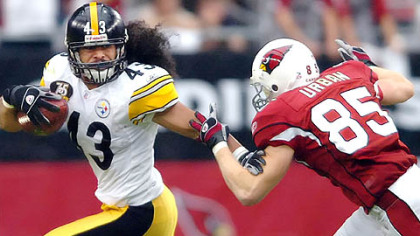 Troy Polamalu picks up a Arizona fumble in the third quarter yesterday at University of Phoenix Stadium in Glendale, Ariz.