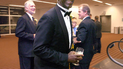 Former Steeler John Stallworth greets other former Steelers Jack Ham and Gary Anderson at the Steelers 75th Season Gala at the David L. Lawrence Convention Center.