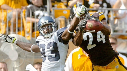 The Steelers' Ike Taylor tries to intercept a ball intended for Seahawks receiver Deion Branch in the first quarter yesterday.