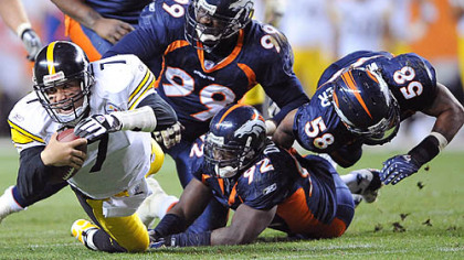 Ben Roethlisberger is tackled after a short gain in the fourth quarter.
