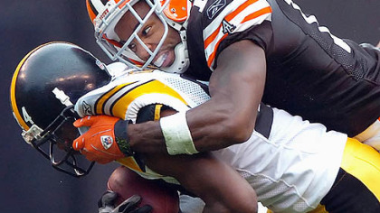 
Ike Taylor is tackled after intercepting a ball intended for the Browns Braylon Edwards Sept. 9.