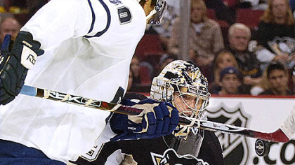 Marc-Andre Fleury makes save against the Leafs Nic Antropov.