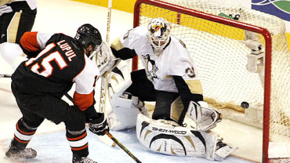 Penguins goalie Dany Sabourin is unable to stop a shot by the Flyers' Joffrey Lupul for a first-period goal Tuesday night in Philadelphia. Lupul earned a hat trick by scoring two more goals against the Penguins.