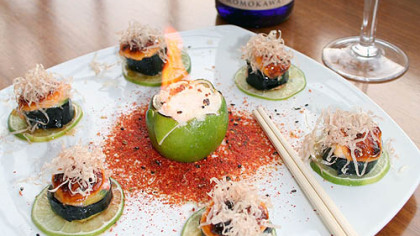 Sushi and a saketini go together at Masu, on the border of Portland's Pearl District. A "St. Helen's Volcano," made of whitefish, crab, scallops, shrimp and avocado flames with a volcano cream sauce, eel sauce and smoked bonito. It's paired with a cucumber-and-lime saketini made with wine from Portland's own SakeOne, the only American-owned sakery in the United States.