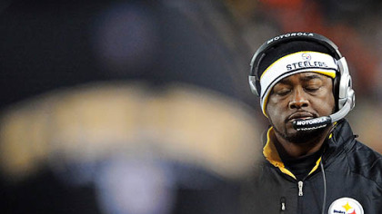 Coach Mike Tomlin shows his dismay after Ben Roethlisberger throws an interception in the first quarter.