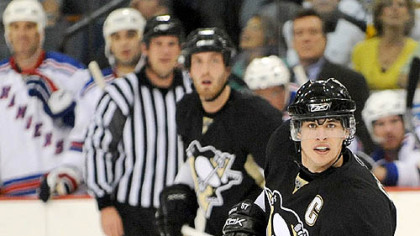 Sidney Crosby looks up the ice for a pass against the Rangers.