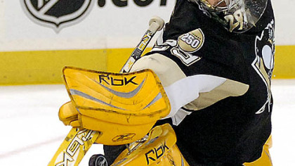  Marc-Andre Fleury makes a save.