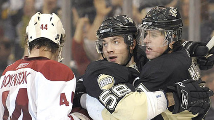 Kris Letang  celebrates his goal with Evgeni Malkin in the third period last night.
(vs Coyotes 12/2/2007)