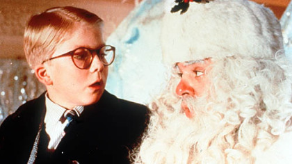 Peter Billingsley as Ralphie and Jeff Gillen as Santa Claus in the movie "A Christmas Story."