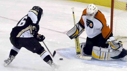 Erik Christensen beats the Flyers' Martin Biron last season.