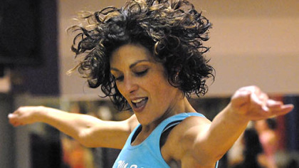 Maria McCalister leads a Zumba aerobics exercise class at Club 1 in Shadyside last month.