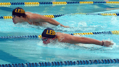 Dan Eckel, 20, and Doug Dietrich, 17, work on their butterfly stroke at the Mt. Lebanon municipal pool. Both qualified for the 200 butterfly at the Olympic trials next year.
