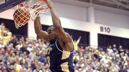 Pitt's Sam Young dunks in front of Duquesne's Aaron Jackson last night at the Palumbo Center. (at Dukes 12/05/2007)