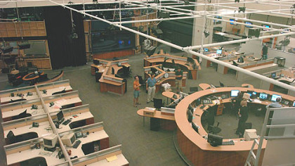 A view of the Channel 11 newsroom from a second-floor conference room.